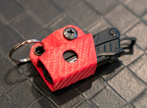 Gaine Kydex Clip & Carry : Gerber Dime/Leatherman Squirt - Fibre de carbone rouge